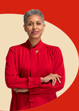 A State Farm agent in red blouse and scarf smiles